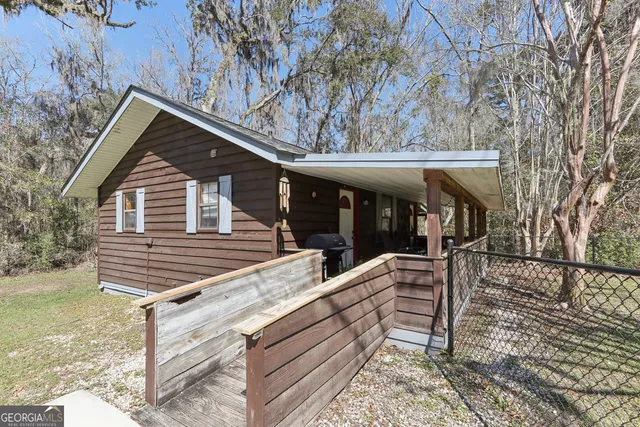 a view of a large pool with an outdoor space