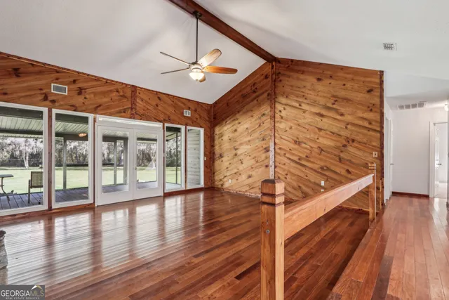 a view of entryway with wooden floor