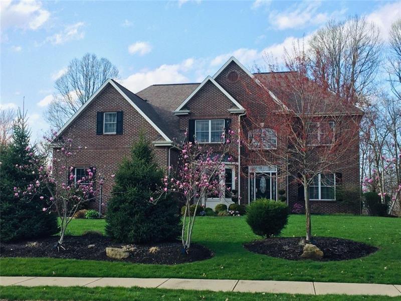 Beautiful Provincial Style home situated on 1.15 acres, beautifully treed, private rear yard.