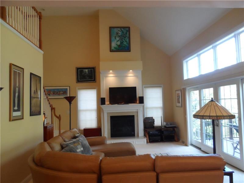 816 Mt Pleasant Road Mars, PA 16046 - Photo 8 of 25 Comfortable Family room with vaulted ceiling, fireplace, access to rear deck