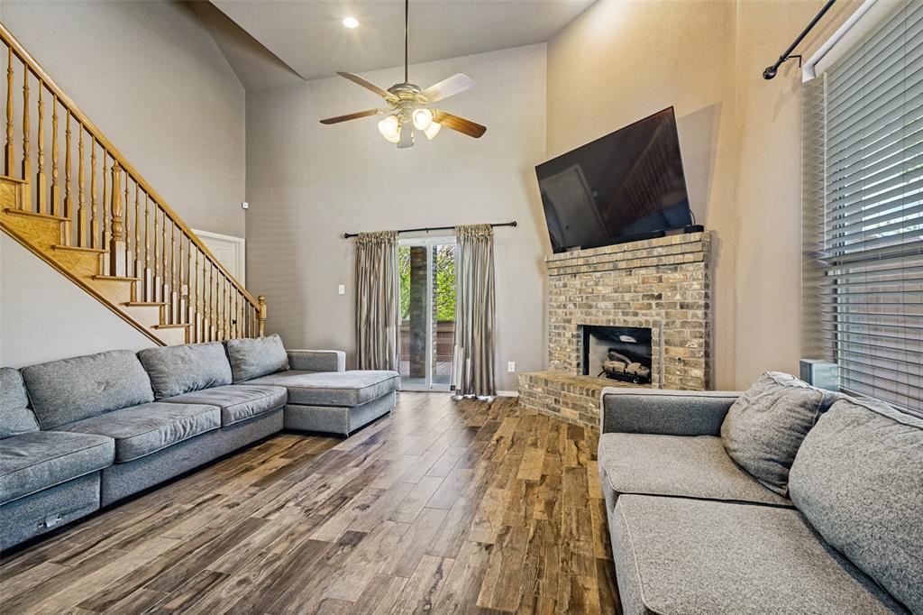 1 Pleasant Valley Sanger, TX 76266 - Photo 3 of 37 View of the spacious living room from the front door. The door to the left of the sliding door leads to the master bedroom.