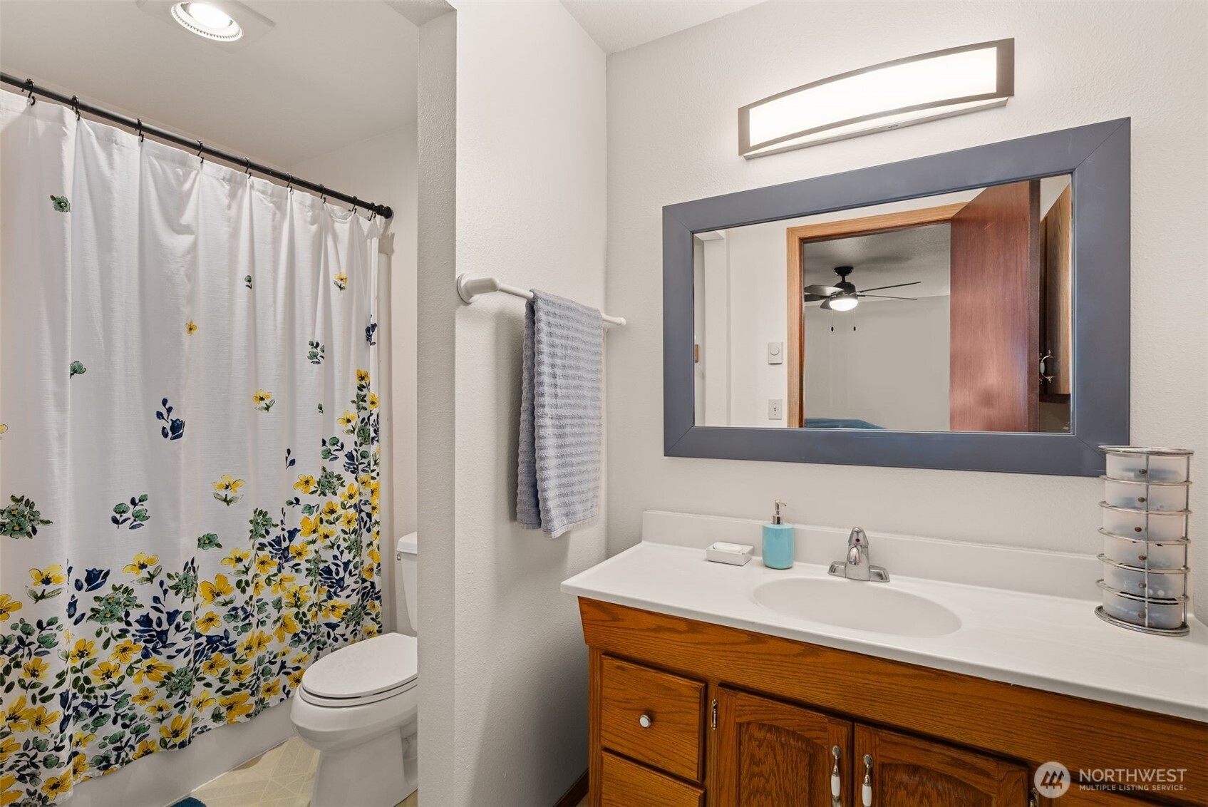 119 River Heights Road Centralia, WA 98531 - Photo 17 of 40 a bathroom with a granite countertop sink and a mirror