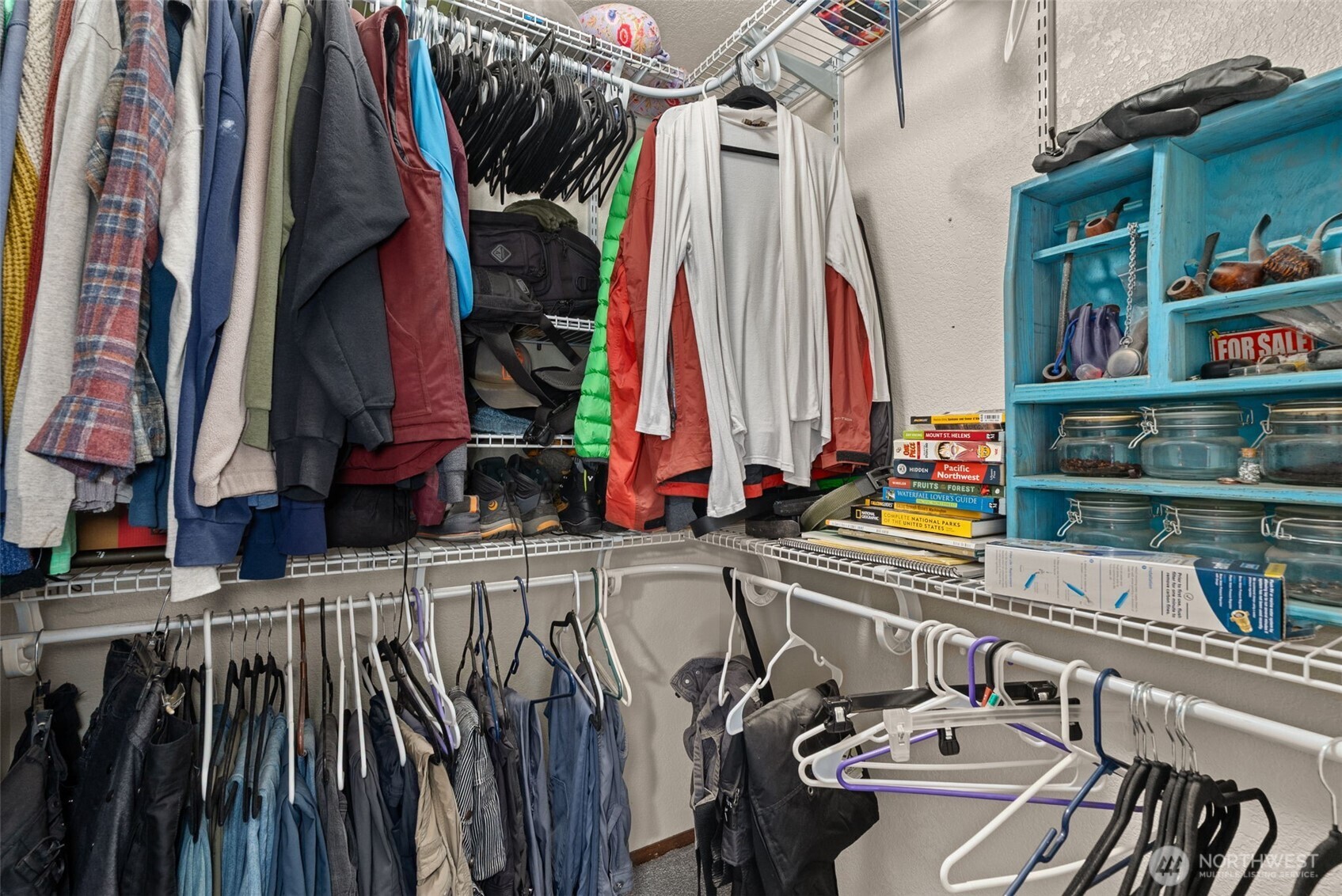 119 River Heights Road Centralia, WA 98531 - Photo 18 of 40 a view of walk in closet with clothes and shoes
