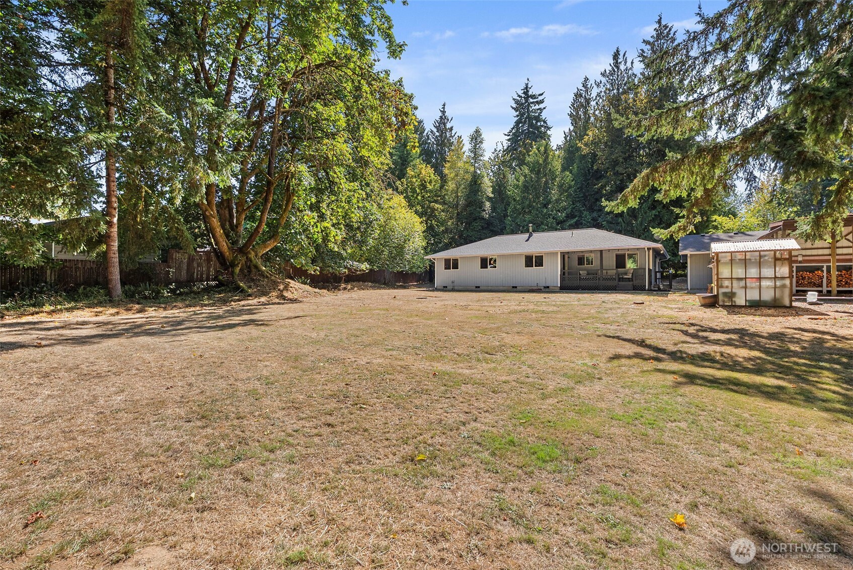119 River Heights Road Centralia, WA 98531 - Photo 28 of 40 a view of house with outdoor space and trees in the background