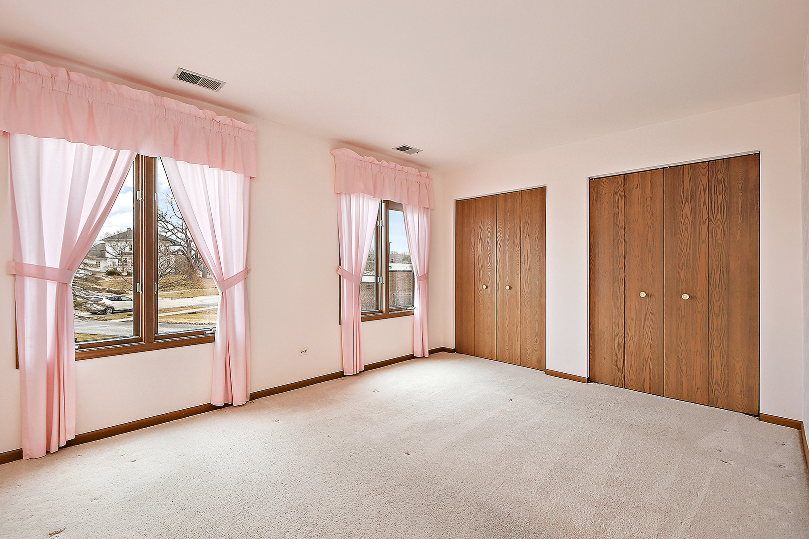 9722 West Creek Road, Unit E2 Palos Park, IL 60464 - Photo 12 of 18 a view of an empty room with a window