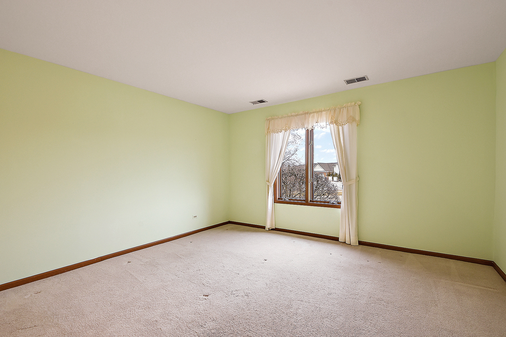 9722 West Creek Road, Unit E2 Palos Park, IL 60464 - Photo 15 of 18 an empty room with windows