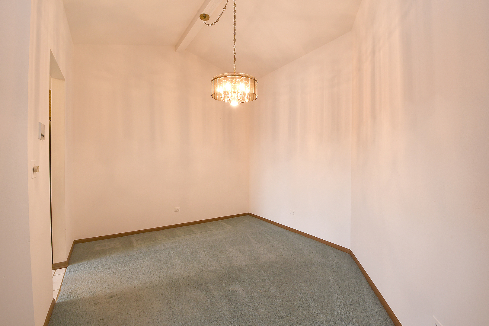 9722 West Creek Road, Unit E2 Palos Park, IL 60464 - Photo 5 of 18 a view of a chandelier fan in a room