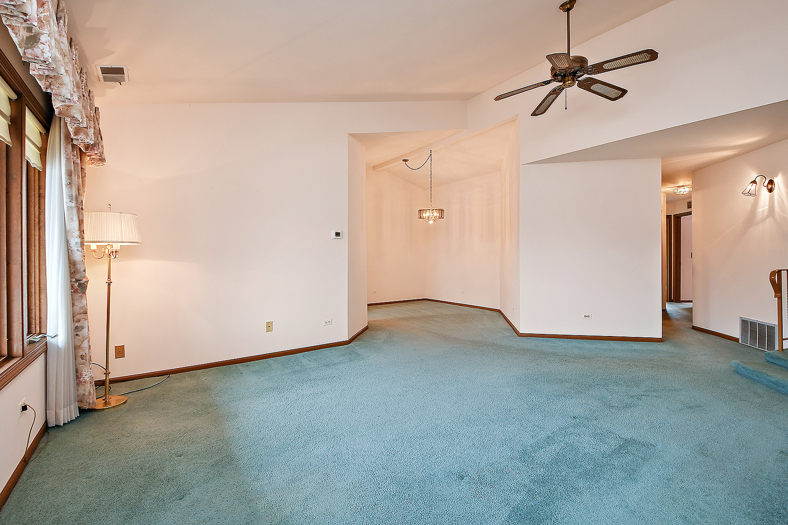 9722 West Creek Road, Unit E2 Palos Park, IL 60464 - Photo 6 of 18 a view of empty room with ceiling fan