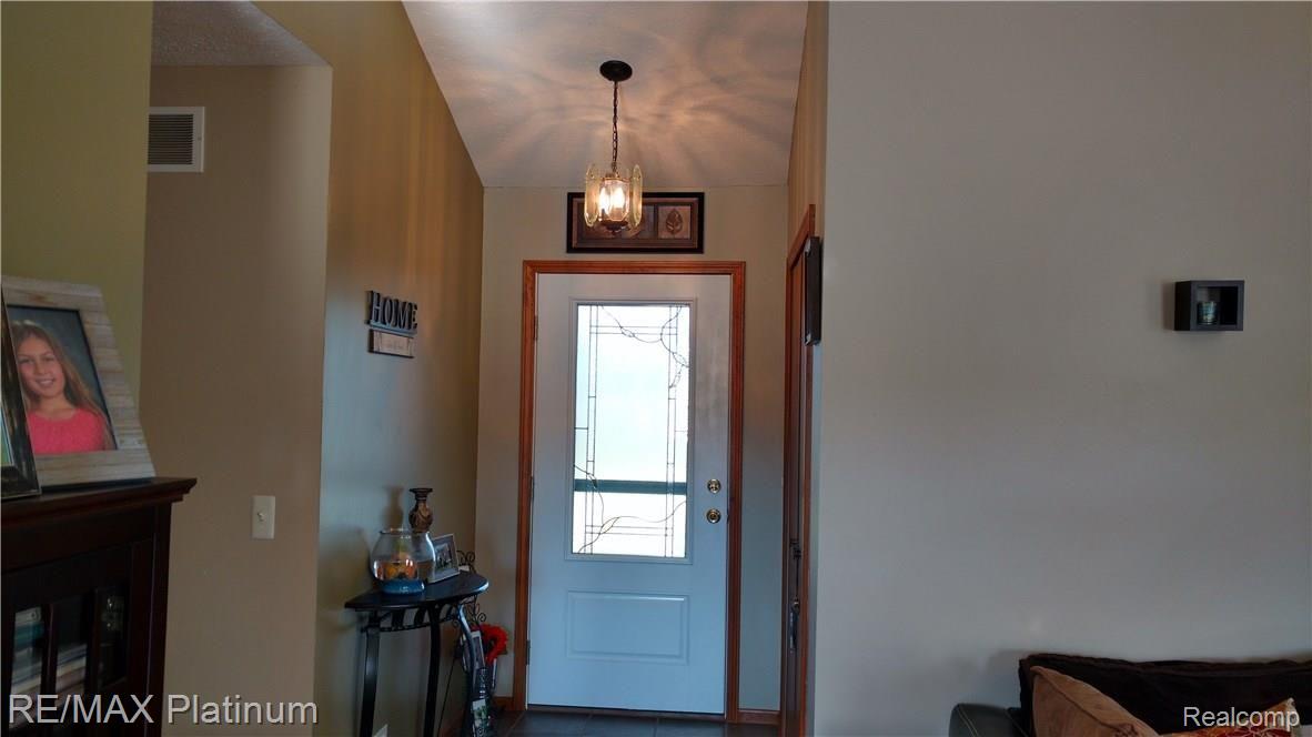 5457 North Fleming Road Fowlerville, MI 48836 - Photo 12 of 19 SLATE FOYER