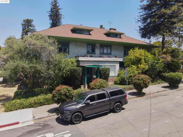 a car parked in front of a house