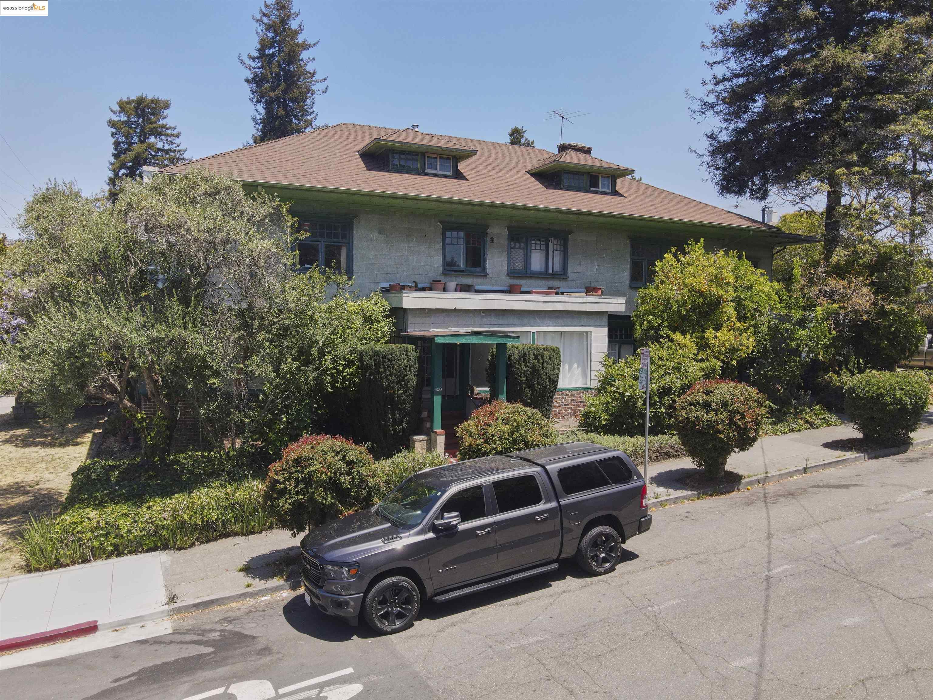 400 Lagunitas Avenue Oakland, CA 94610 - Photo 2 of 13 a car parked in front of a house