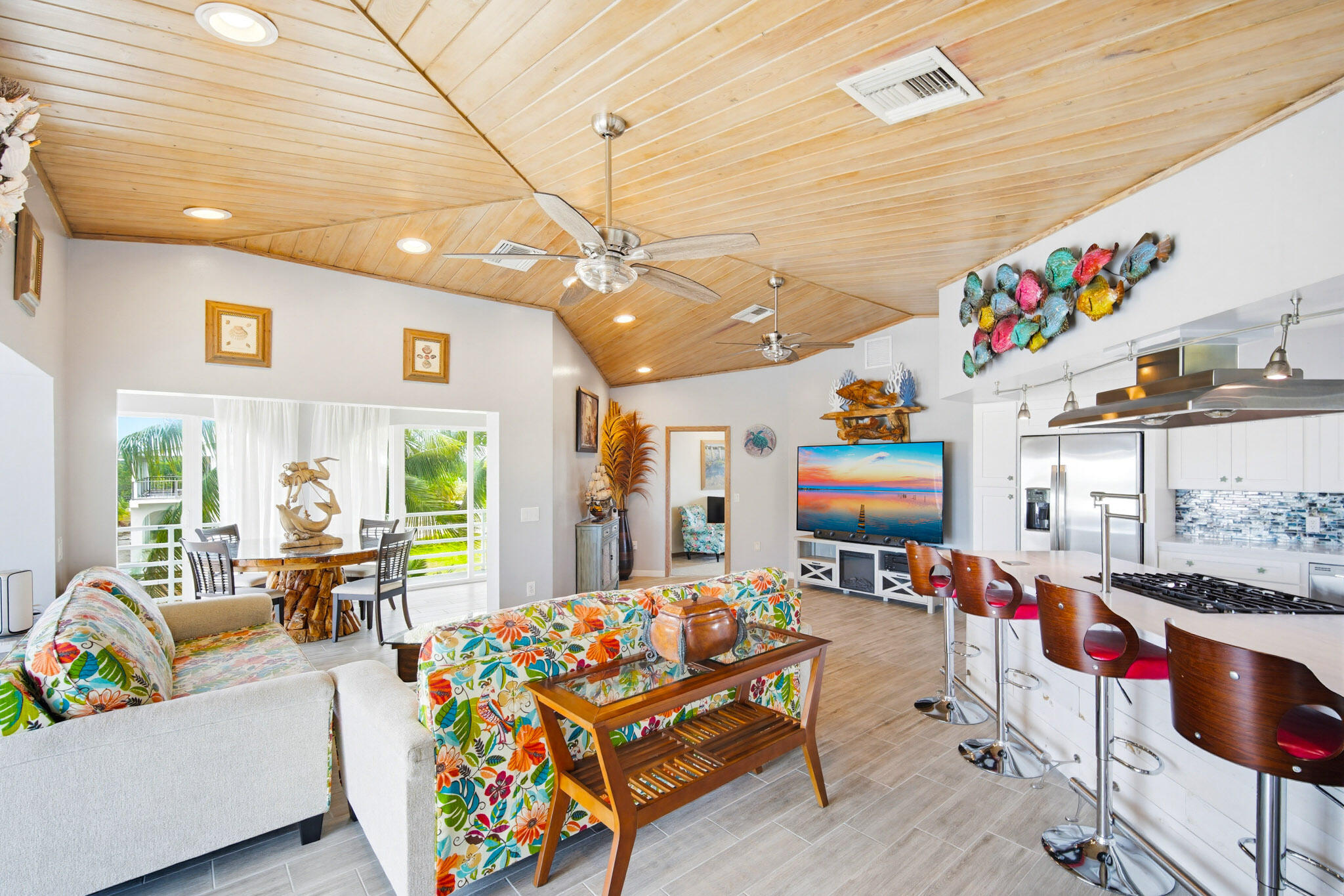 30463 Hawk Lane Big Pine Key, FL 33043 - Photo 20 of 64 a living room filled with lots of furniture and a flat screen tv