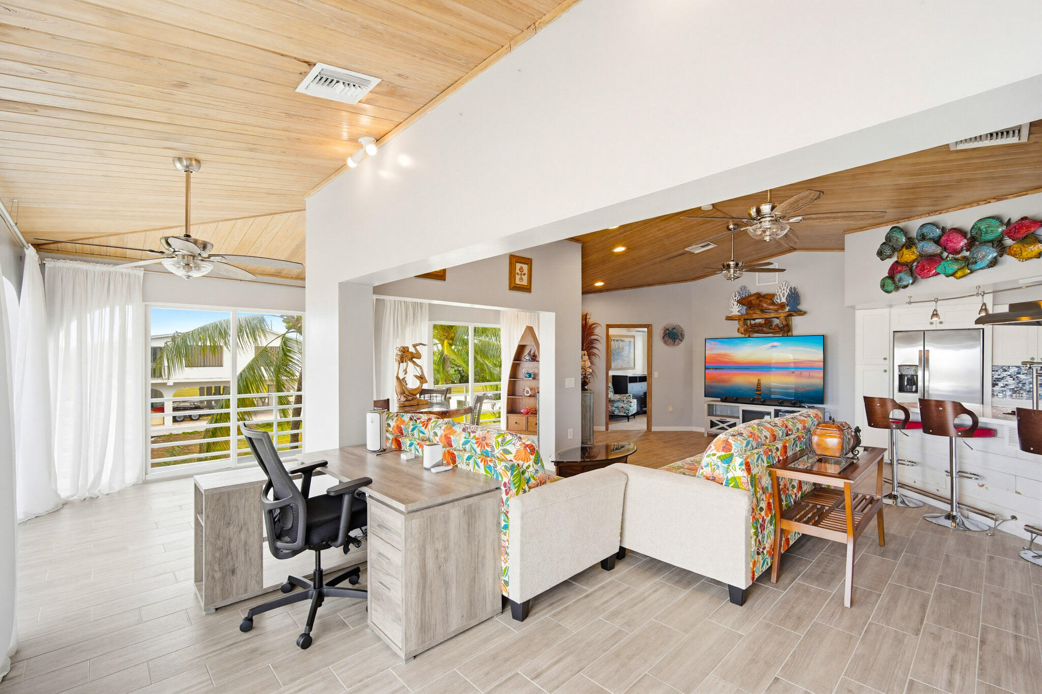 30463 Hawk Lane Big Pine Key, FL 33043 - Photo 21 of 64 a living room with furniture and a large window