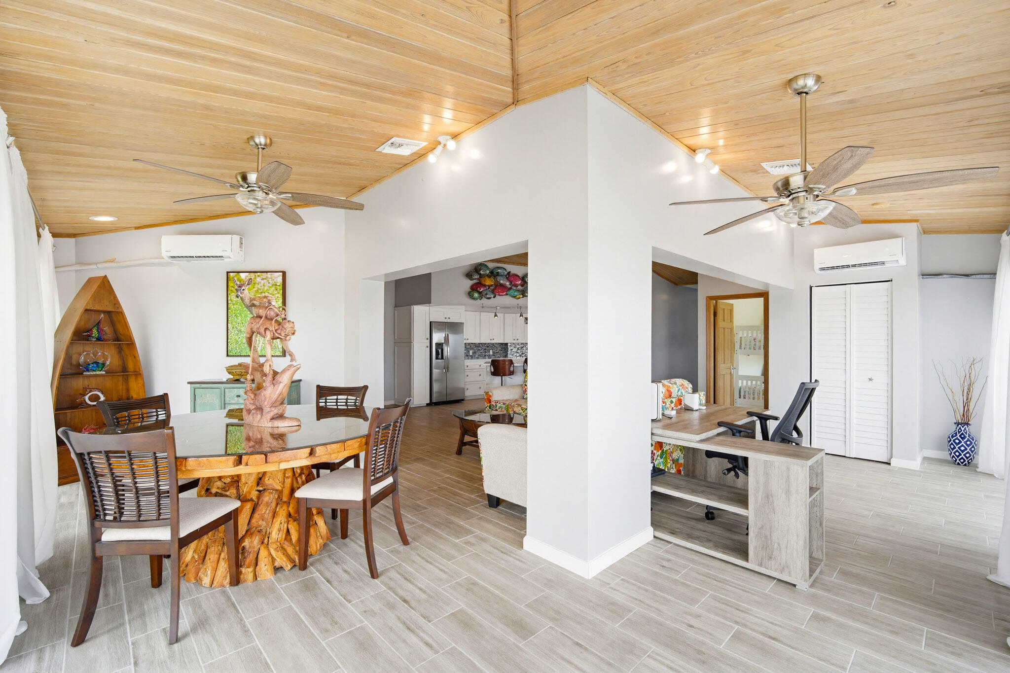 30463 Hawk Lane Big Pine Key, FL 33043 - Photo 23 of 64 a view of a dining room with furniture and wooden floor