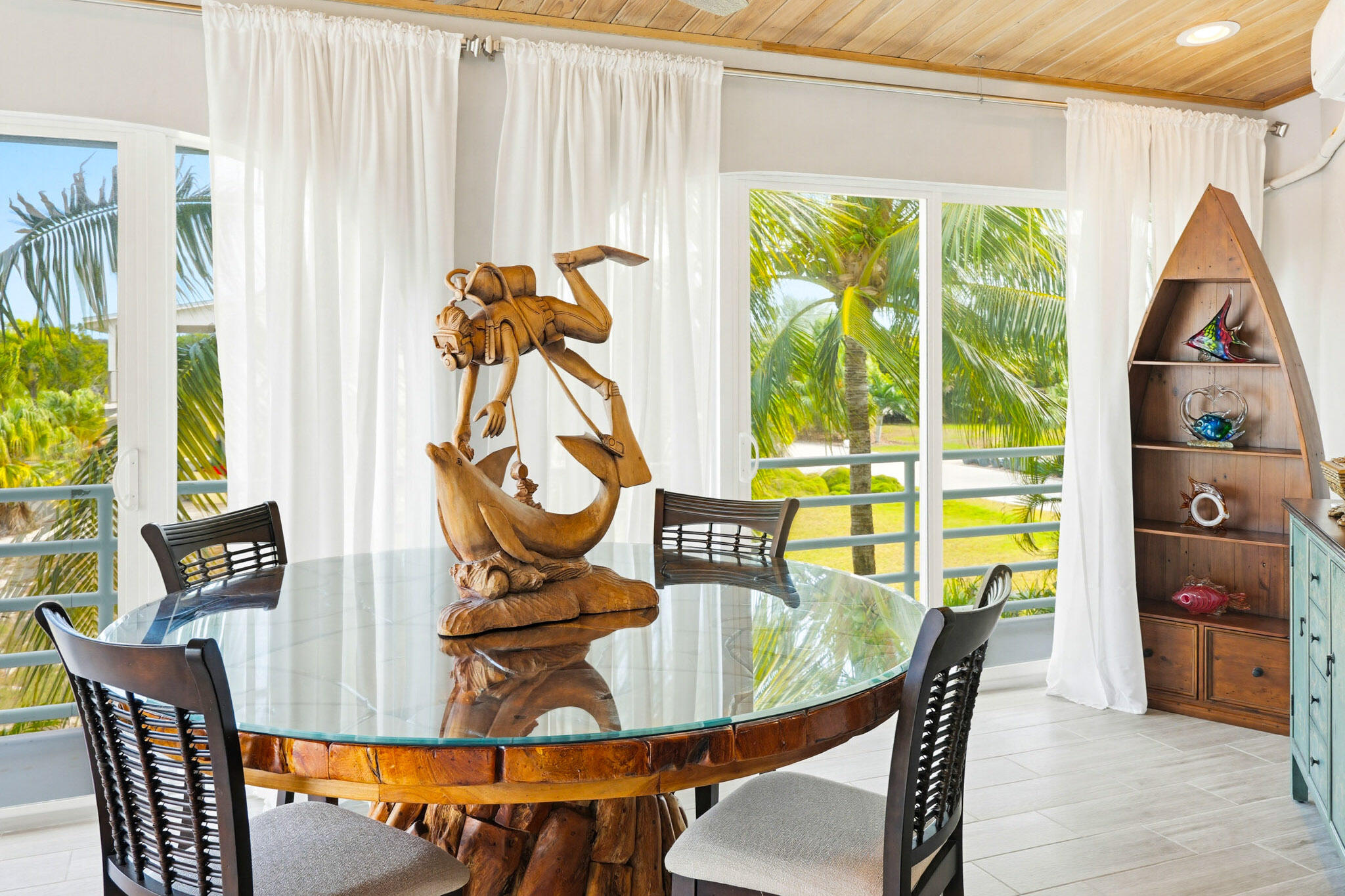 30463 Hawk Lane Big Pine Key, FL 33043 - Photo 26 of 64 a view of a dining room with furniture window and outside view