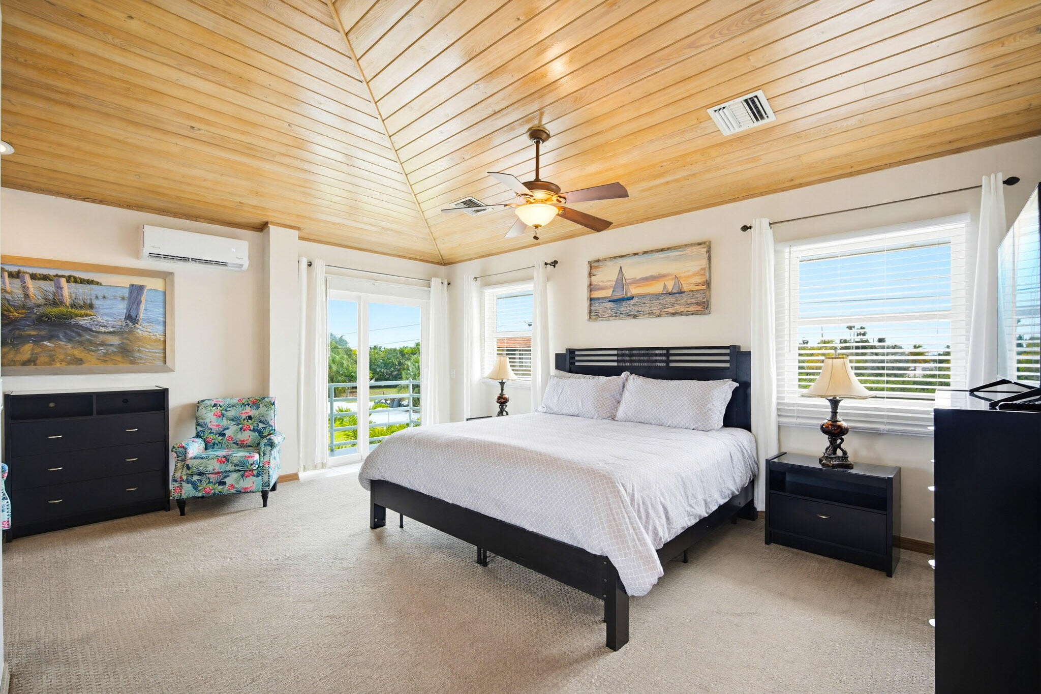 30463 Hawk Lane Big Pine Key, FL 33043 - Photo 28 of 64 a bedroom with a bed and a couch