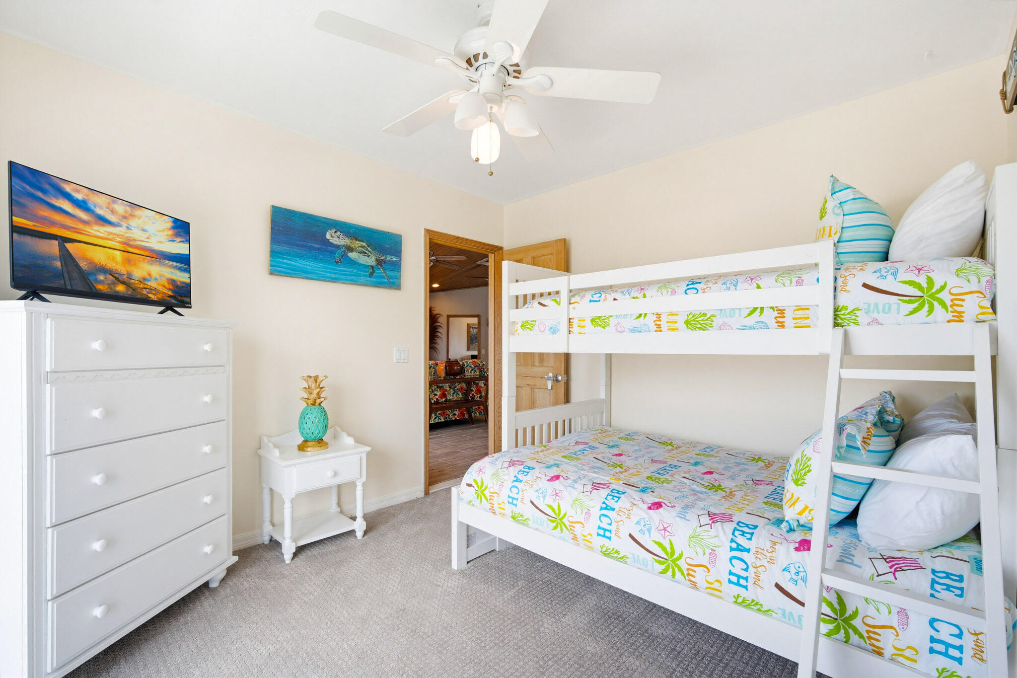 30463 Hawk Lane Big Pine Key, FL 33043 - Photo 33 of 64 a bedroom with a bed and a dresser in it