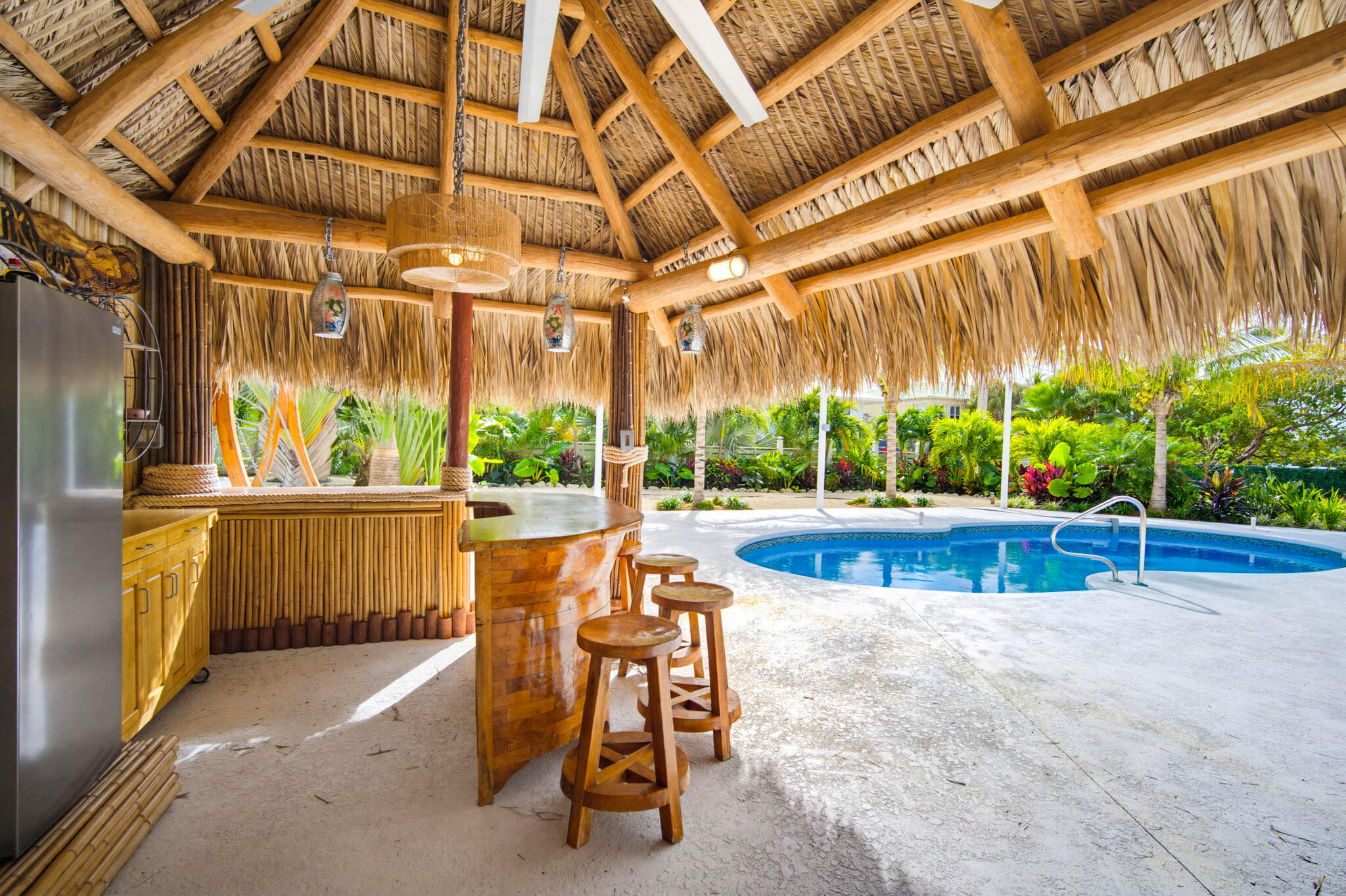 30463 Hawk Lane Big Pine Key, FL 33043 - Photo 44 of 64 a view of a patio with a table and chairs