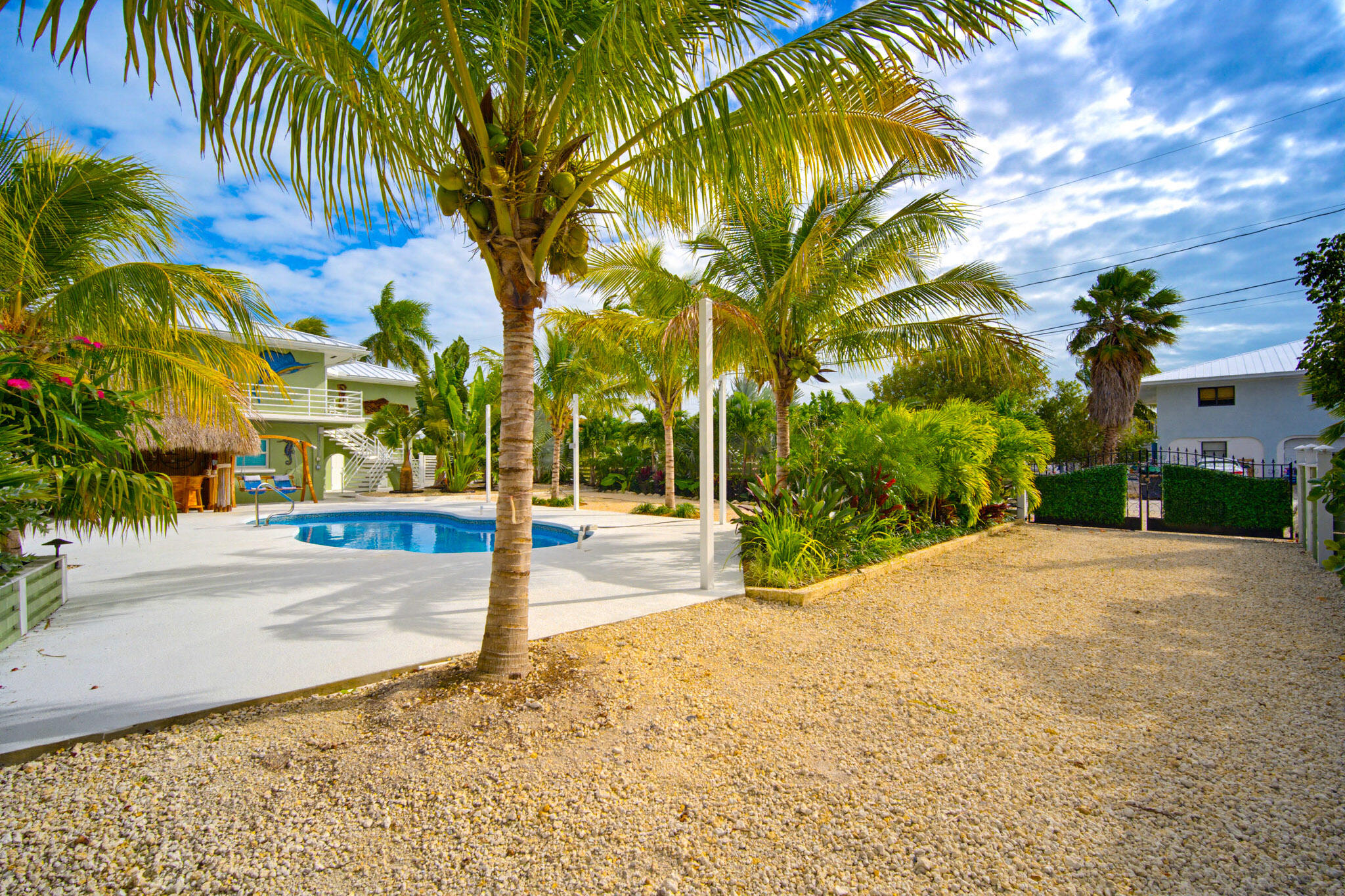 30463 Hawk Lane Big Pine Key, FL 33043 - Photo 45 of 64 a view of a street with palm trees