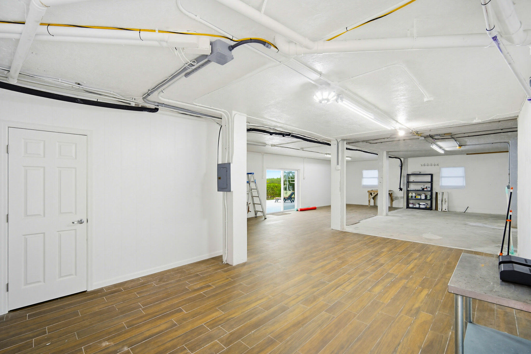 30463 Hawk Lane Big Pine Key, FL 33043 - Photo 49 of 64 a view of a room with wooden floor