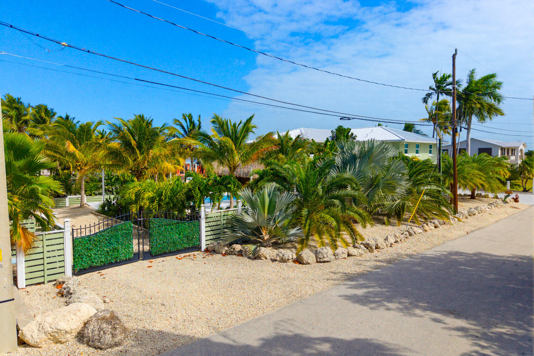 30463 Hawk Lane Big Pine Key, FL 33043 - Photo 61 of 64 a view of a street with a building in front of it
