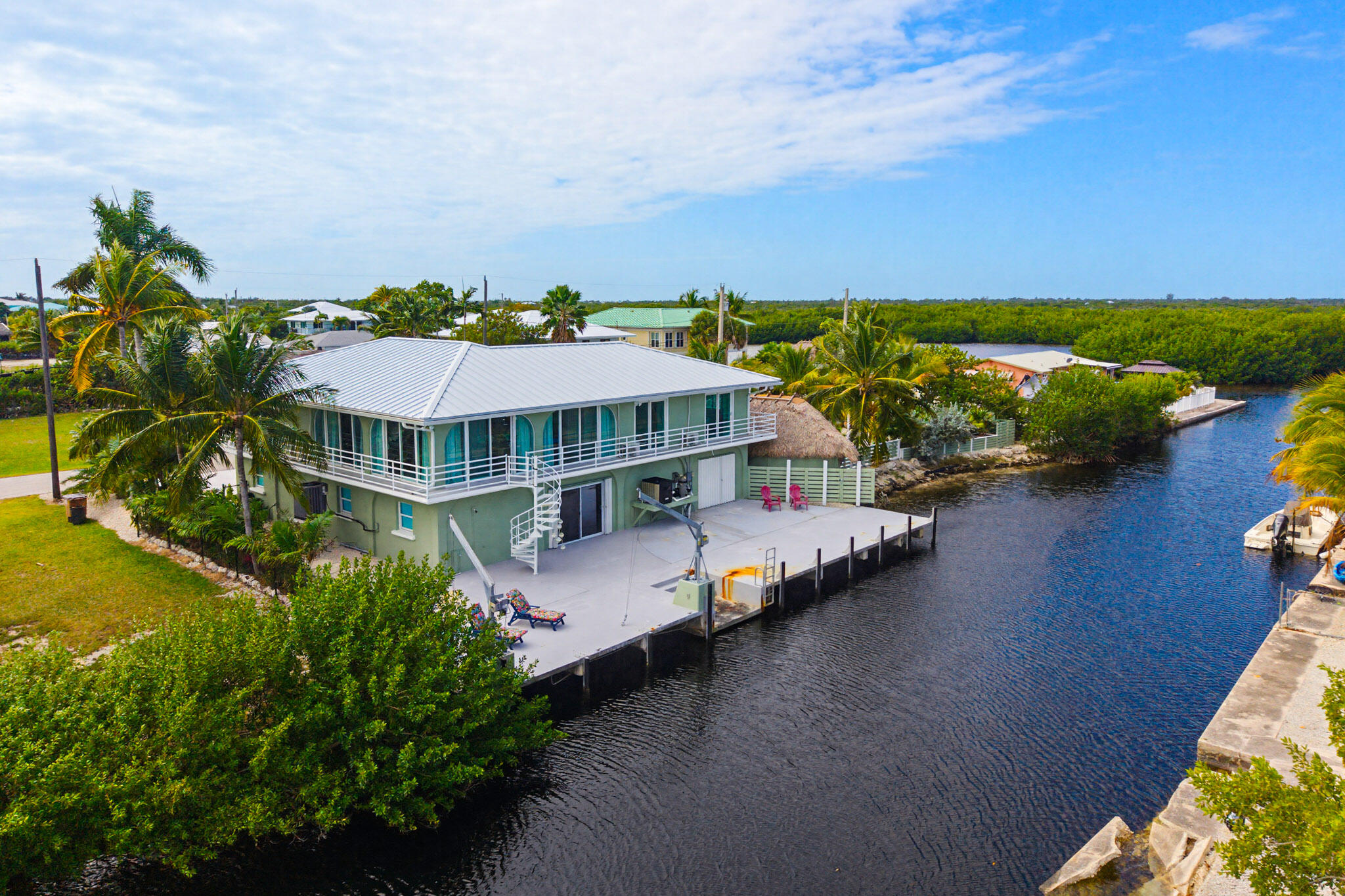 30463 Hawk Lane Big Pine Key, FL 33043 - Photo 8 of 64 an aerial view of a house with a garden space