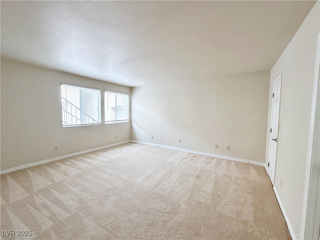 4431 Alexis Drive, Unit 421 Las Vegas, NV 89103 - Photo 21 of 35 Primary Bedroom