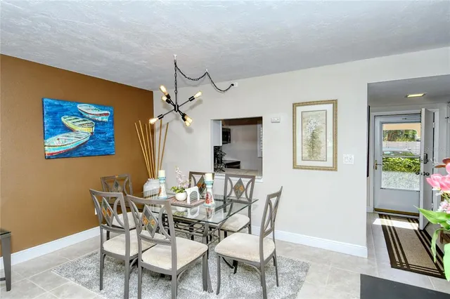 a view of a lake with a house swimming pool and outdoor space