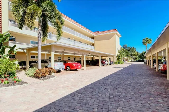a view of a street with cars