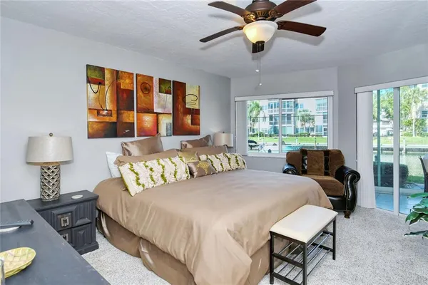 a view of a garden with a building in the background