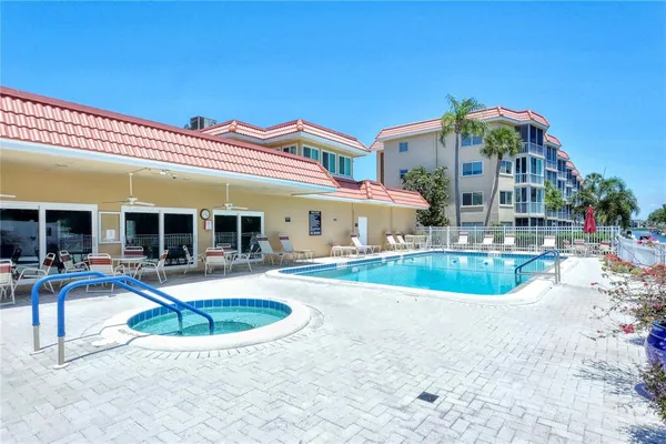 a front view of a house with parking space