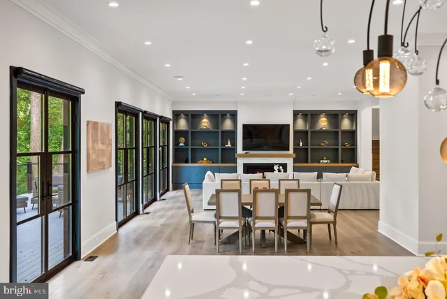 a kitchen with a refrigerator and a sink