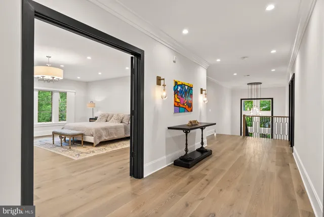 a spacious bedroom with a large bed and a couch