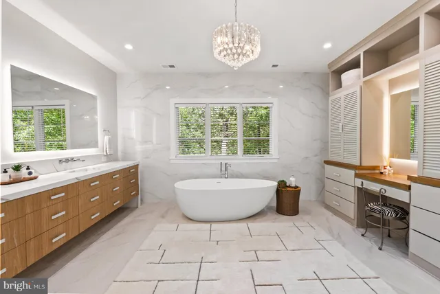 a bathroom with a shower sink and mirror