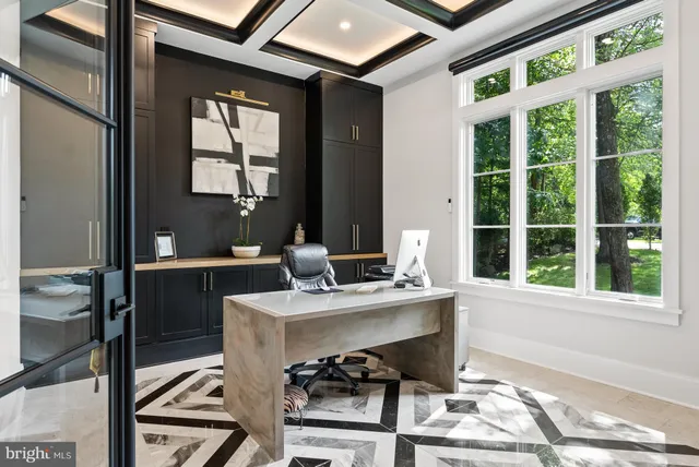 a workspace with furniture and a window