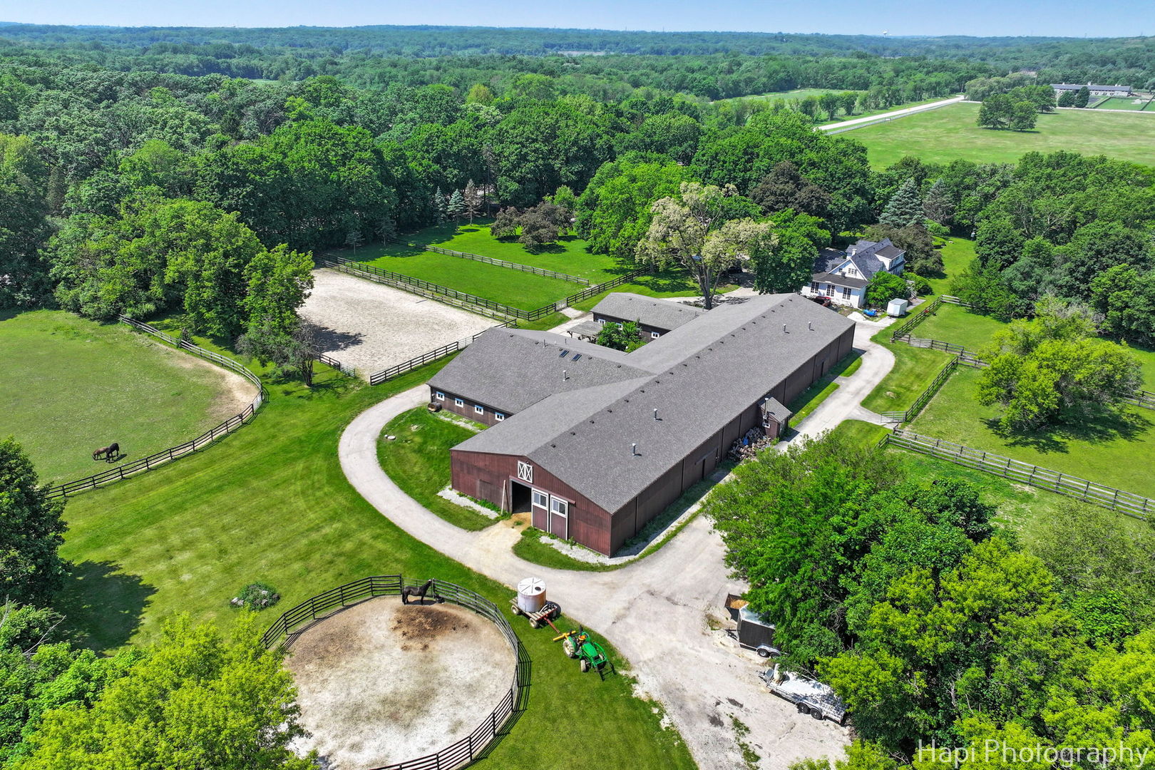 23 West County Line Road Barrington Hills, IL 60010 - Photo 13 of 71 an aerial view of a house with a garden and trees