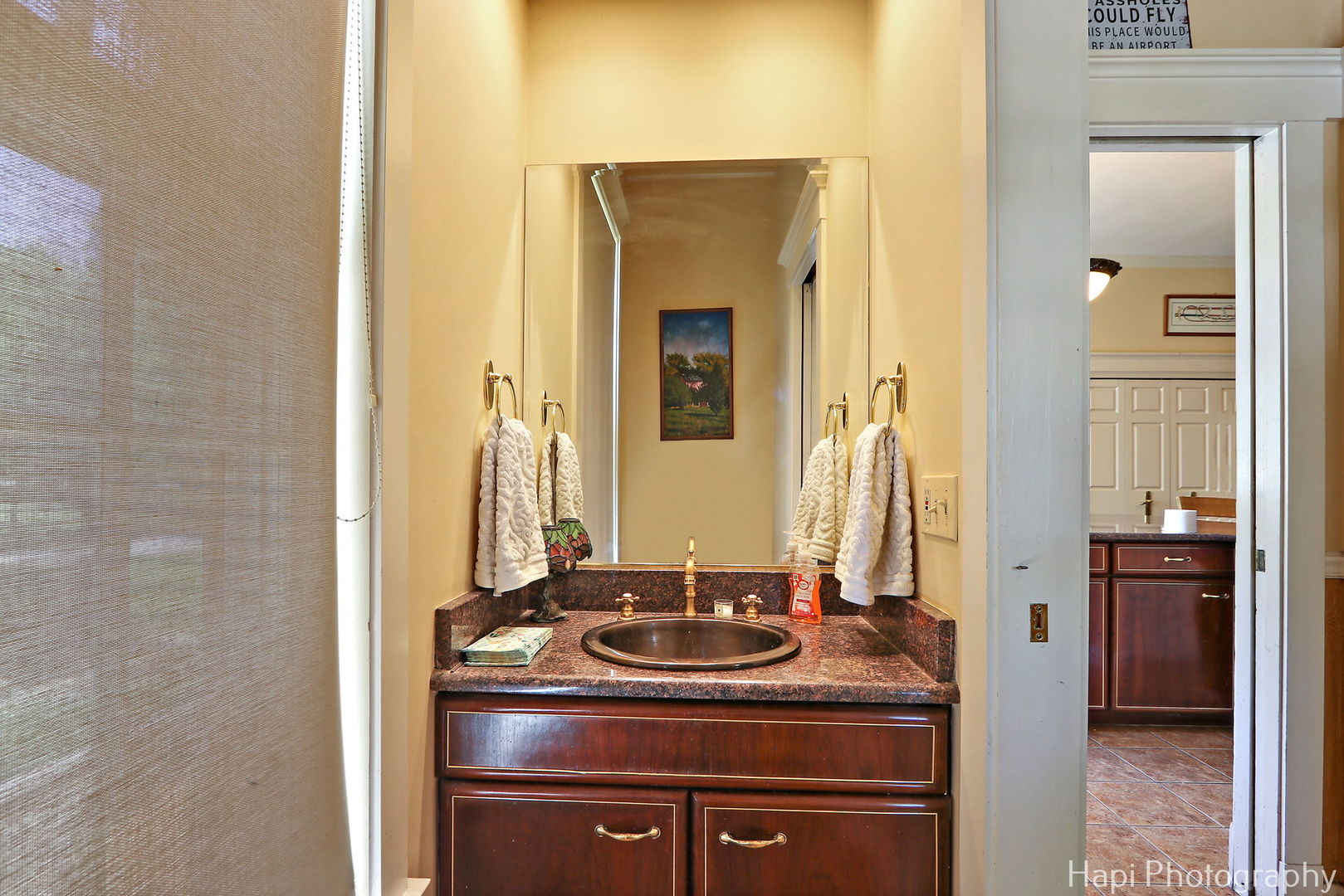 23 West County Line Road Barrington Hills, IL 60010 - Photo 22 of 71 a bathroom with a granite countertop sink a mirror and a