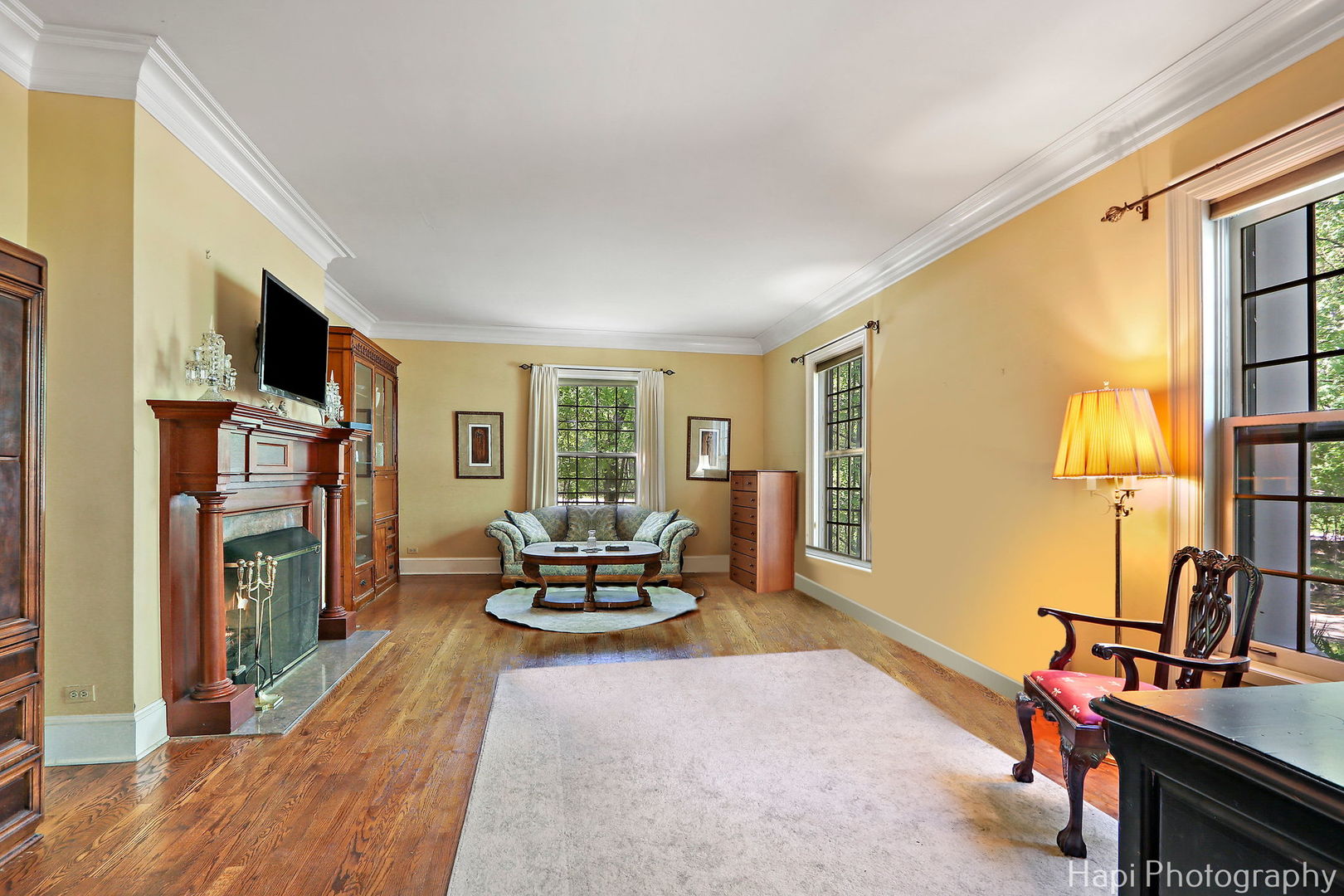 23 West County Line Road Barrington Hills, IL 60010 - Photo 26 of 71 a living room with furniture and a flat screen tv