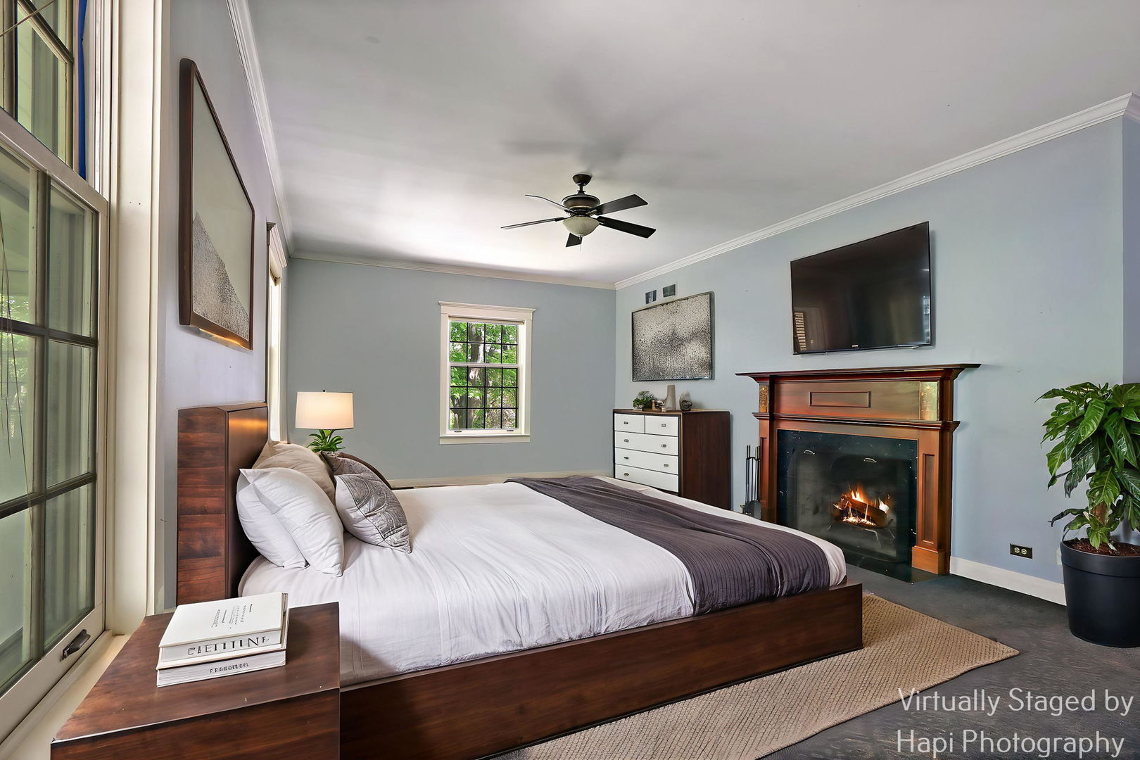 23 West County Line Road Barrington Hills, IL 60010 - Photo 29 of 71 a bedroom with a bed and a fireplace