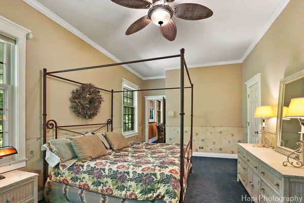 a room with lots of chairs and mirrors