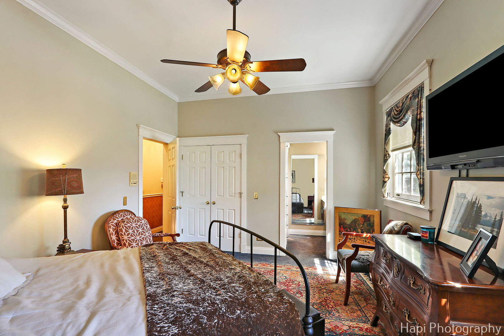 23 West County Line Road Barrington Hills, IL 60010 - Photo 36 of 71 a bedroom with a bed and a chandelier