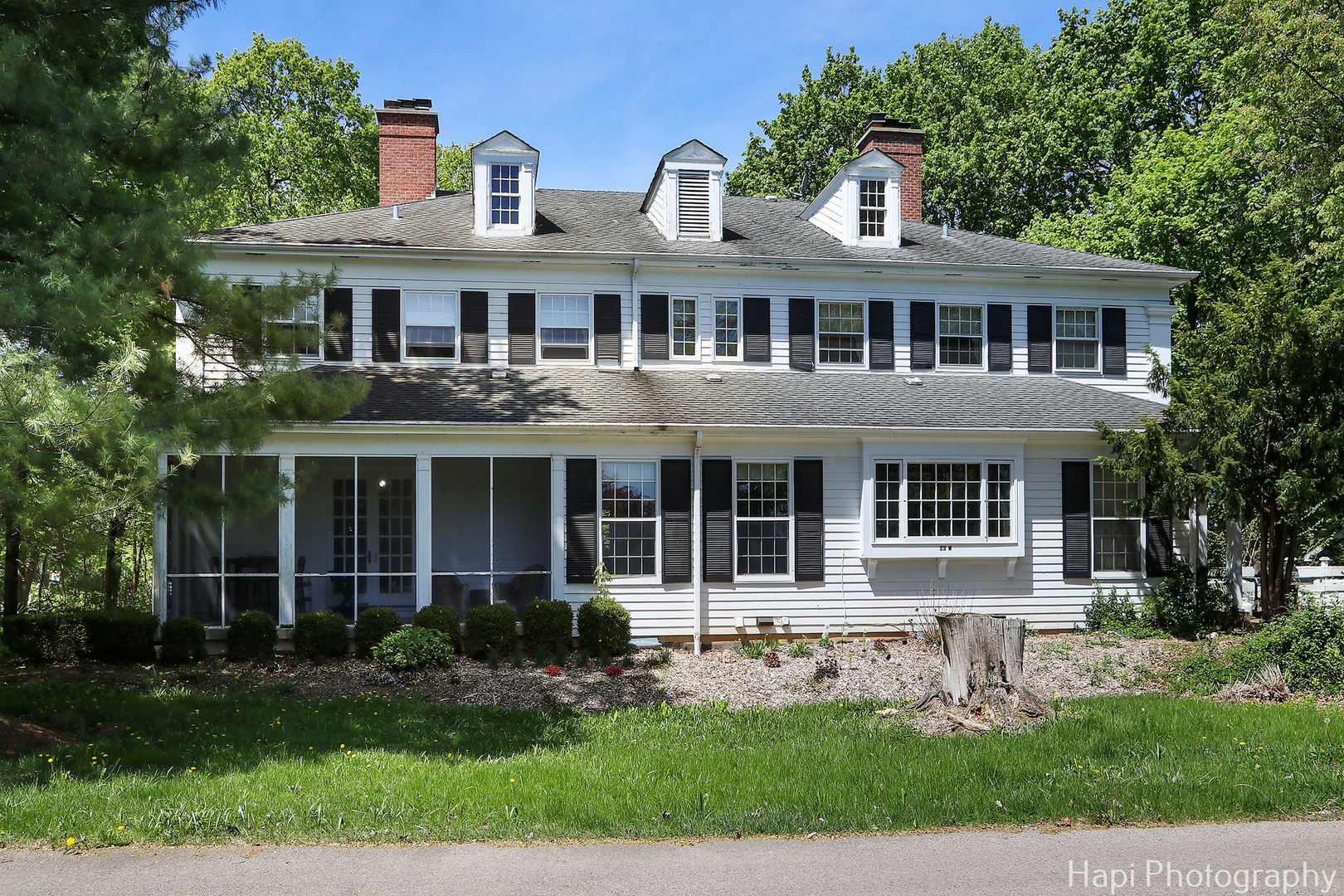 23 West County Line Road Barrington Hills, IL 60010 - Photo 43 of 71 a front view of a house with garden and trees