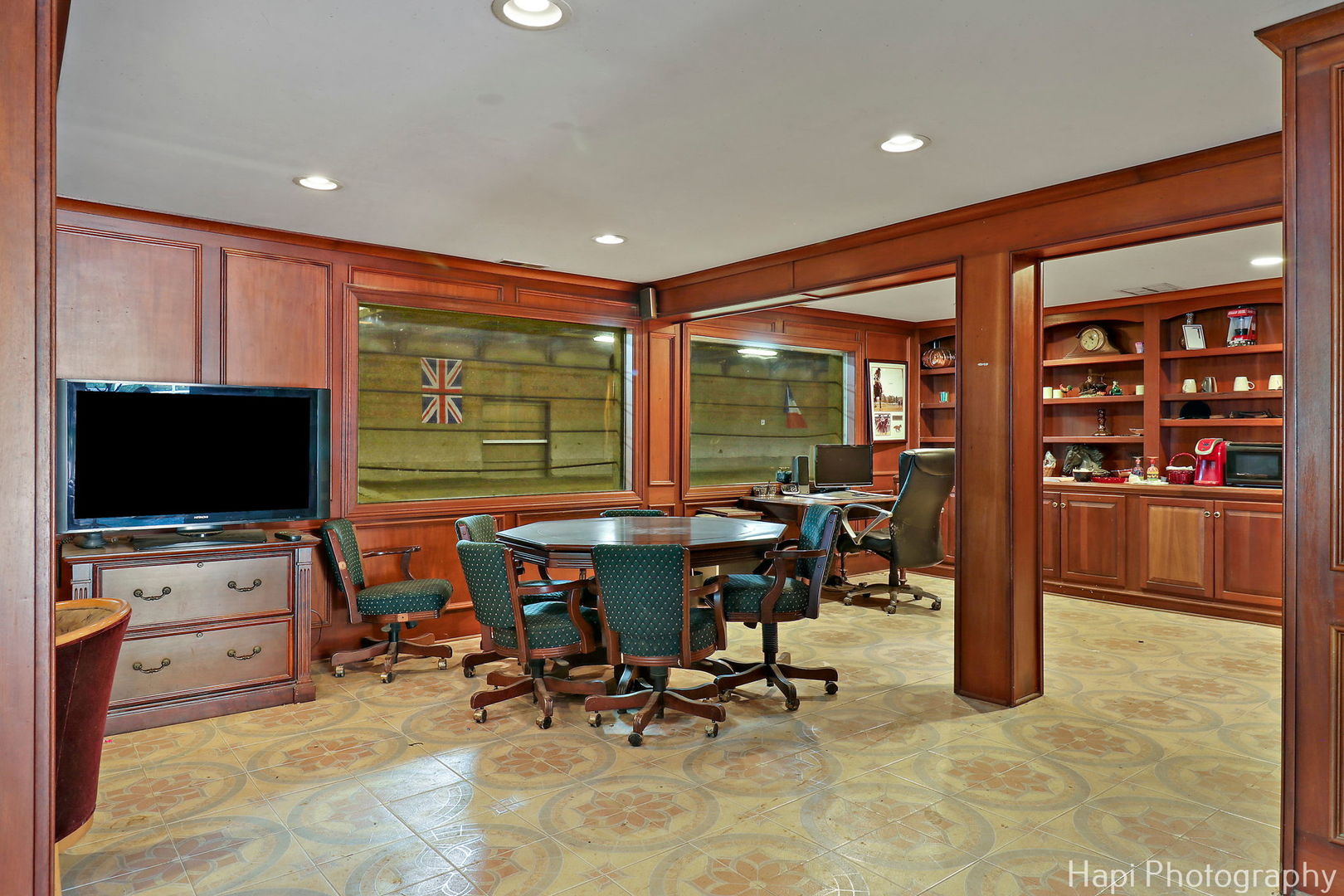23 West County Line Road Barrington Hills, IL 60010 - Photo 56 of 71 a living room with furniture and a flat screen tv