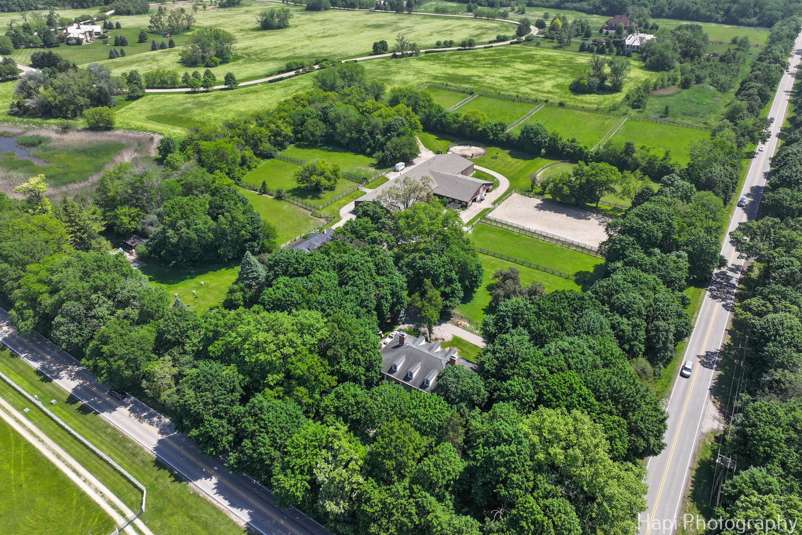 23 West County Line Road Barrington Hills, IL 60010 - Photo 7 of 71 an aerial view of residential house with outdoor space and trees all around