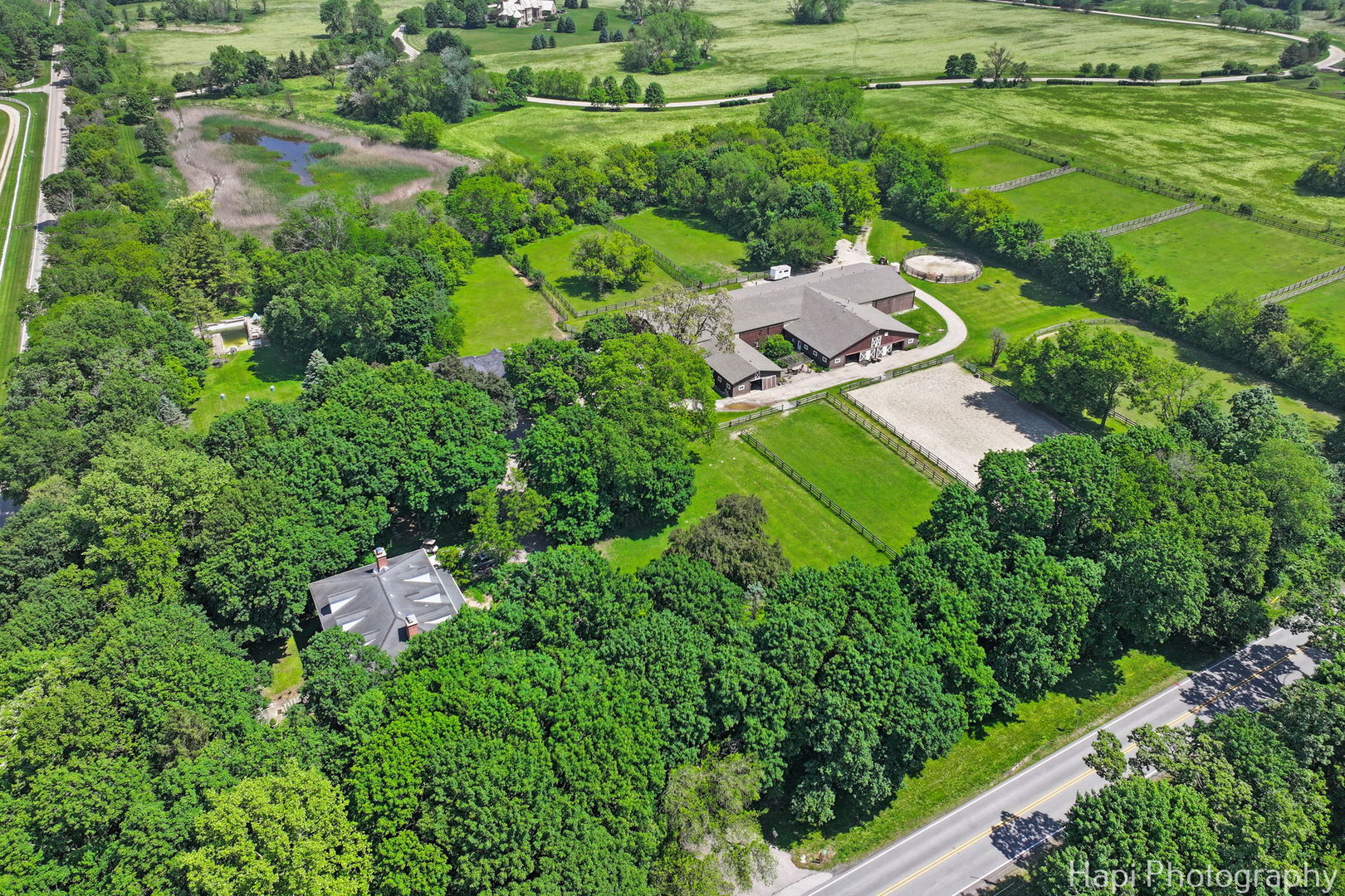 23 West County Line Road Barrington Hills, IL 60010 - Photo 8 of 71 an aerial view of residential house with outdoor space and trees all around