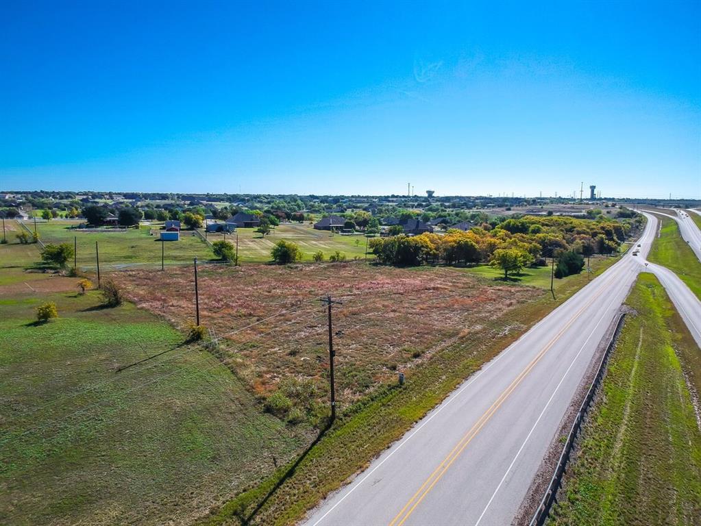 13844 Highway 287 Haslet, TX 76052 - Photo 2 of 4 a view of a lake with a big yard