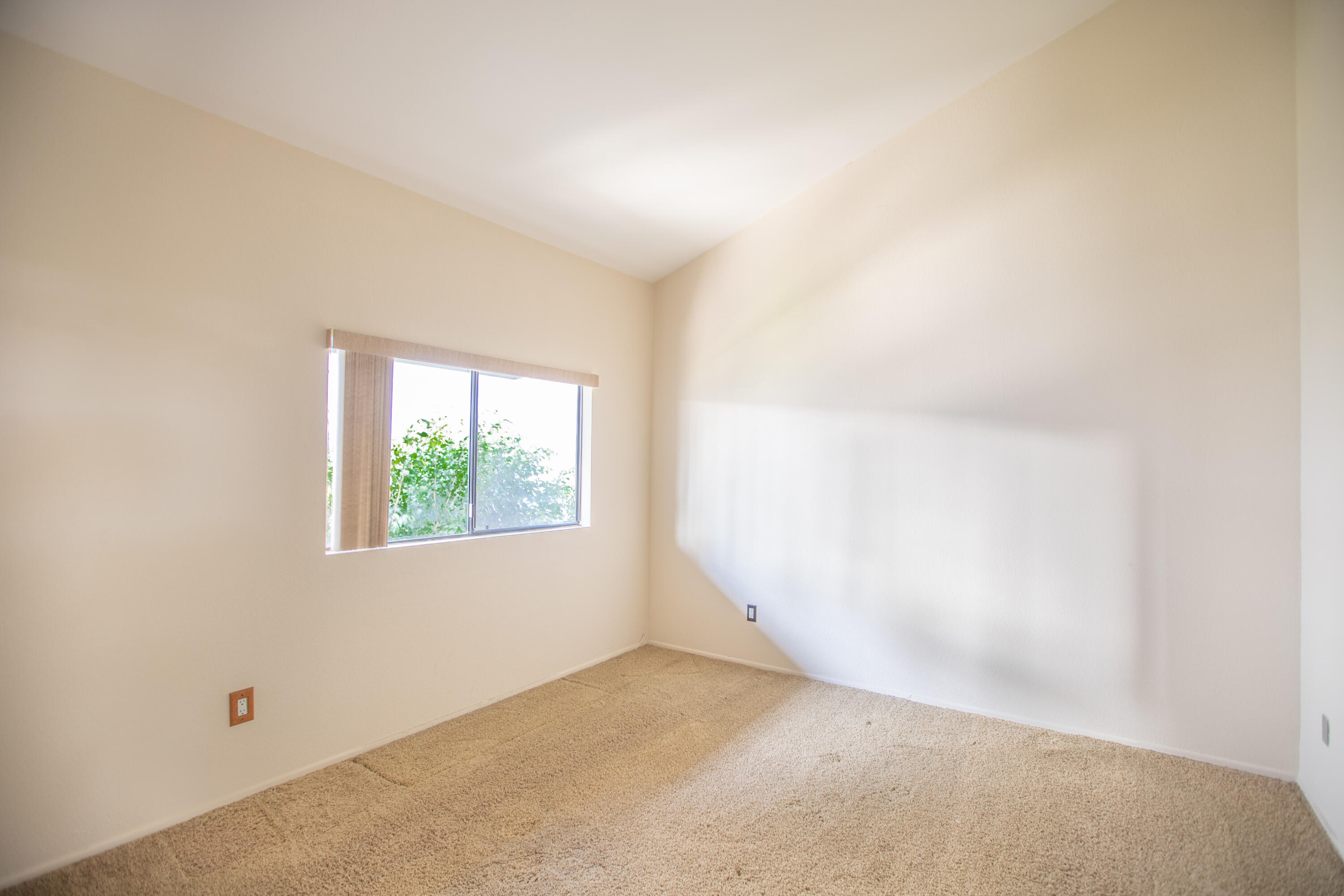 15261 Leffingwell Road, Unit 3 Whittier, CA 90604 - Photo 17 of 33 an empty room with windows