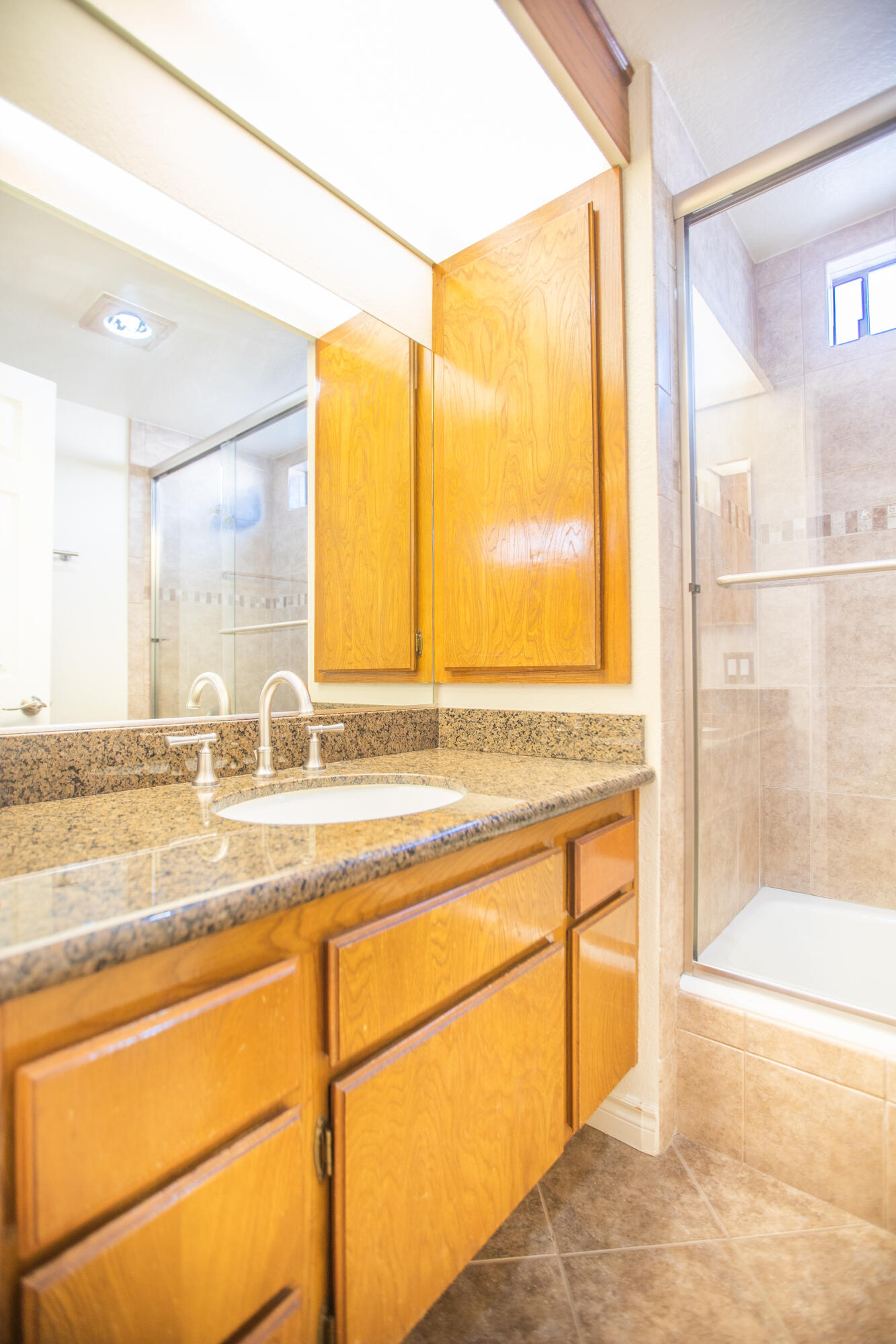 15261 Leffingwell Road, Unit 3 Whittier, CA 90604 - Photo 20 of 33 a view of a kitchen with a sink and a large window