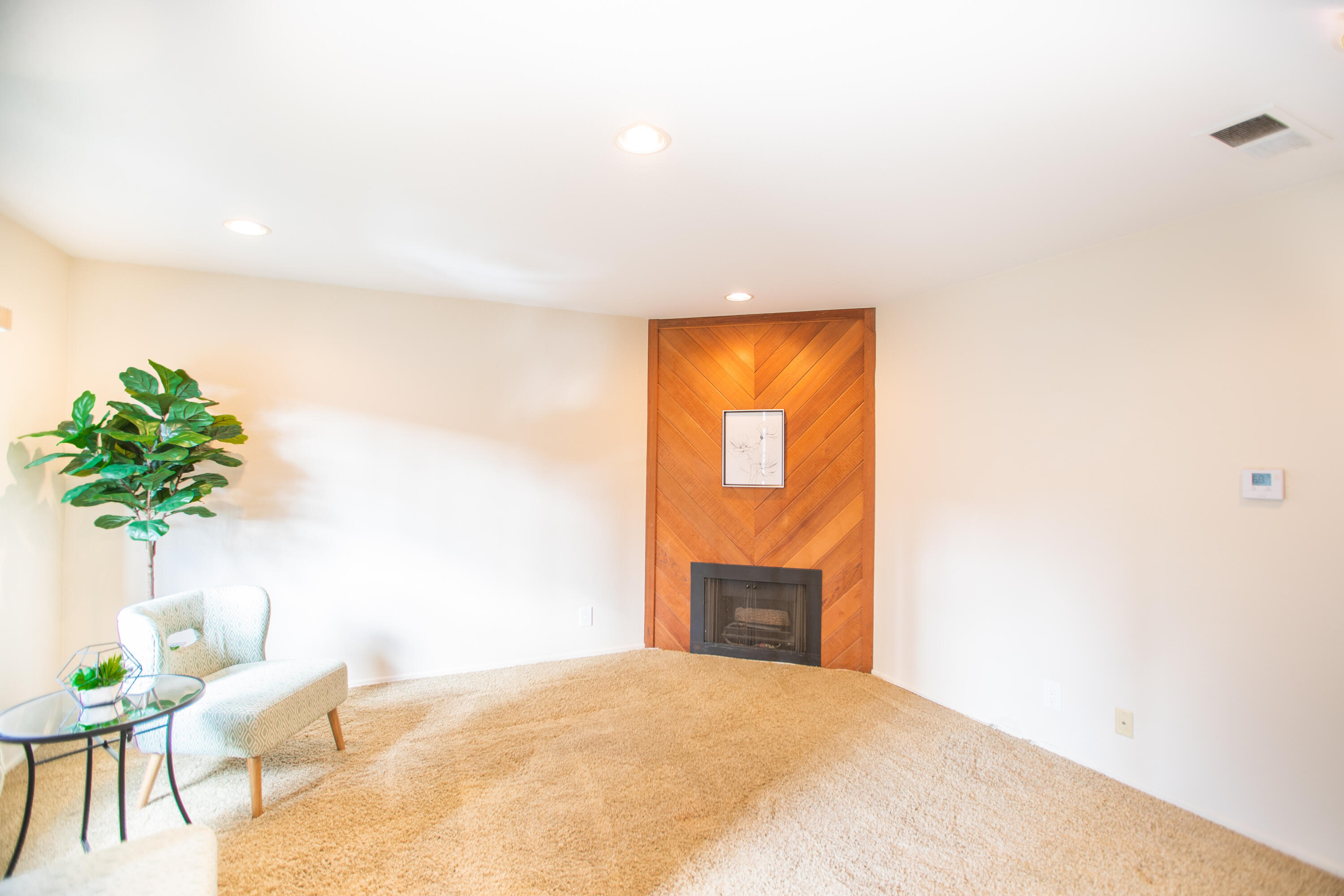 15261 Leffingwell Road, Unit 3 Whittier, CA 90604 - Photo 2 of 33 a bedroom with a bed and a potted plant