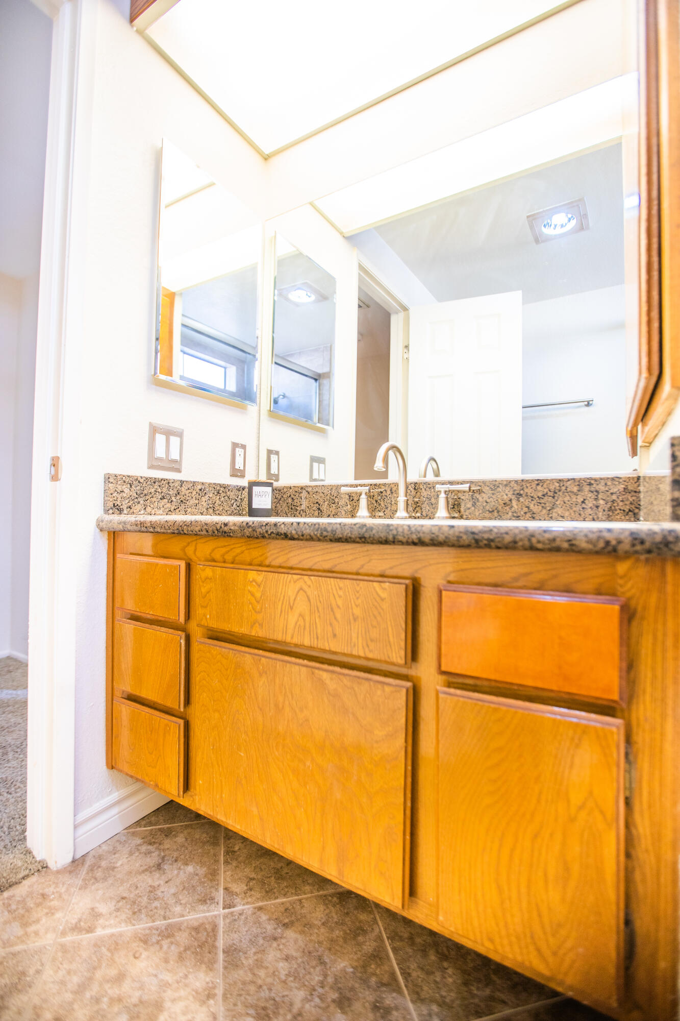 15261 Leffingwell Road, Unit 3 Whittier, CA 90604 - Photo 22 of 33 a bathroom with a sink and a mirror